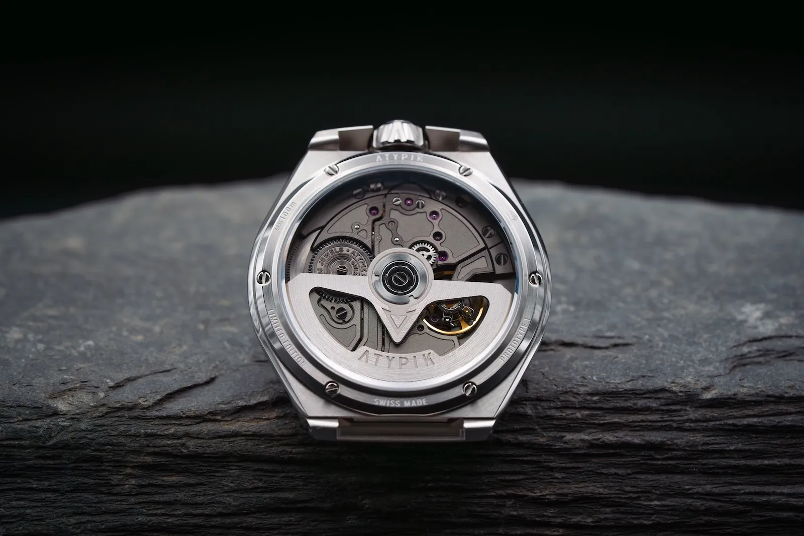 The Kalibre 01 movement seen through the sapphire caseback